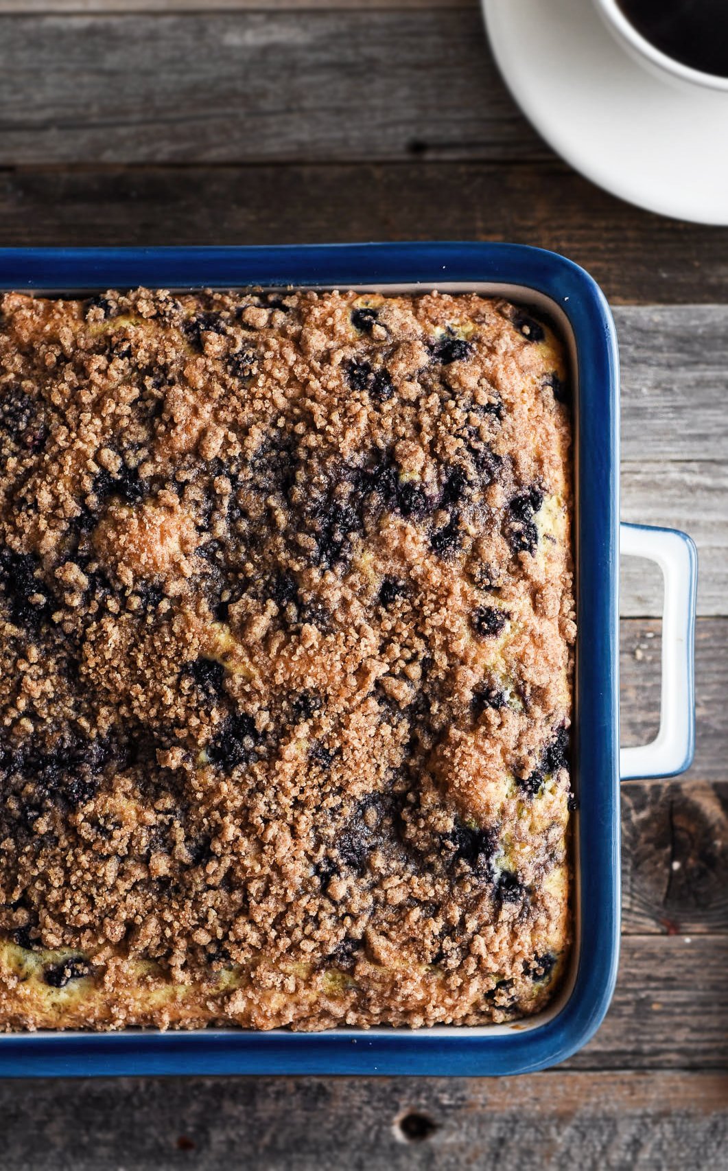 buttermilk blueberry coffee cake in a pan