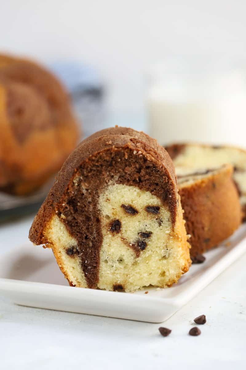 this Chocolate Chip marble bundt cake is studded with chocolate chips and utterly delicious!