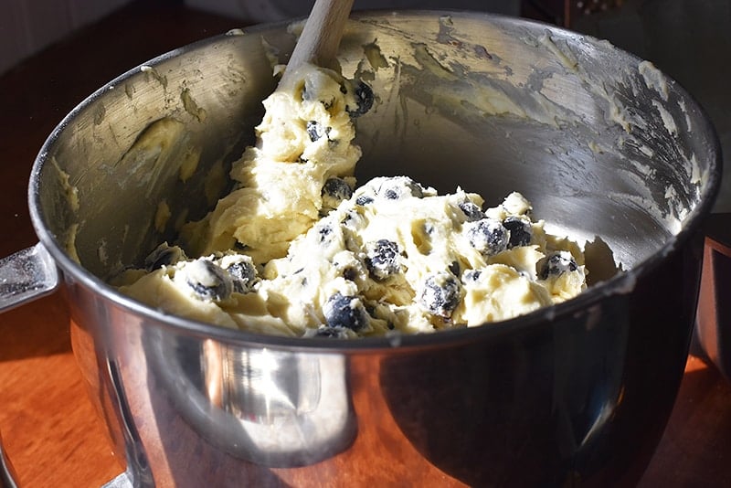 gently fold the fresh blueberries into your lemon blueberry pound cake batter